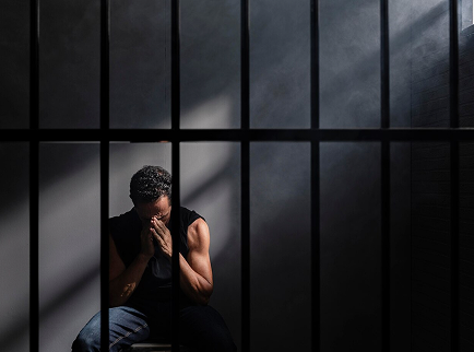 person behind the bars